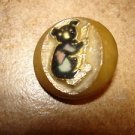 Large plastic button with metal coala bear.
