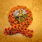 Large pewter button with dancer, flowers & tiny rhinestones.
