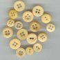 Lot of 17 old faux bone buttons.