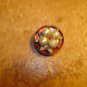 Bowl shape metal button with pearls and tiny rhinestones.