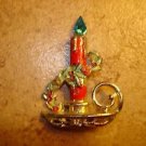 Metal Christmas candel with holder and rhinestone light brooch pin.