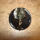Large plastic button with metal wood fairy.