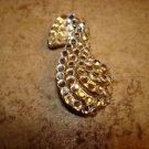 Large metal button in shape of Mother goose with rhinestones. Large metal button in shape of Mother goose with rhinestones.