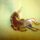 Gold metal unicorn horse pin badge. Gold metal unicorn horse pin badge.