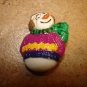 Christmas button with colorful snowman.