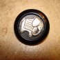 Large plastic button with silver metal elephant.