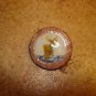 Large plastic button with moose animal.