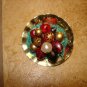 Gold metal bowl shape button with glass, metal & pearl beads.