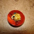 Large plastic button with funny elephant.