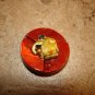 Large plastic button with funny elephant.