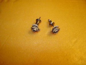 Metal rose earings.