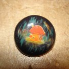 Hard plastic button with mushroom house. Hard plastic button with mushroom house.