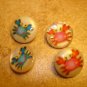 Lot of 4 funny buttons with crabs.