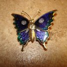 Large metal and cloisane button in shape of butterfly. Large metal and cloisane button in shape of butterfly.