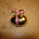 Metal Easter egg button with large bow. Metal Easter egg button with large bow.