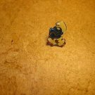 Smurf metal pinback pin.