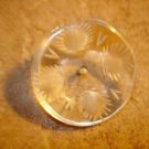 Large carved lucite button.