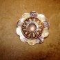 Gold metal cloisonne button purple and yellow.