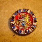 Large metal button with Japanese dragon.