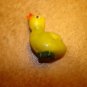 Plastic yellow chicken button.