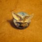 Large metal button with bold eagle bird