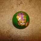 Old dome shape metal button with orange cat & butterfly. Old dome shape metal button with orange cat & butterfly.