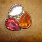 Large metal button with tier shape nicely faceted glass stones.