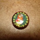Vegetable ivory button with tropical bird.