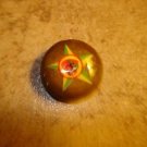 Old vegetable ivory button with funny squirel.