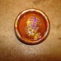 Wood button with orange cat and butterfly.