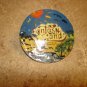 Large picture like metal button Fantasy Land.