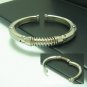 Mangle: A man's Stainless Steel Bangle.