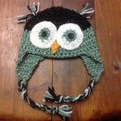 3-6 month green and black owl hat with ear flaps.