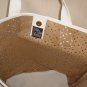 Saks Fifth Avenue Perforated Floral Cutouts Tan and White Tote Bag