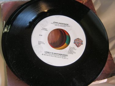 Lonely is another state - She sure got away with my heart John Anderson  7-29207