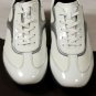 TOD'S SHOES $495 WHITE/SILVER PINHOLE LOGO STRIPE PEBBLE SOLE TRAINER 11 44e NEW