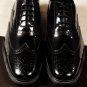TOD'S SHOES $595 BLACK LOGO EMBOSSED WINGTIP PEBBLE SOLE OXFORD 11 44e NEW