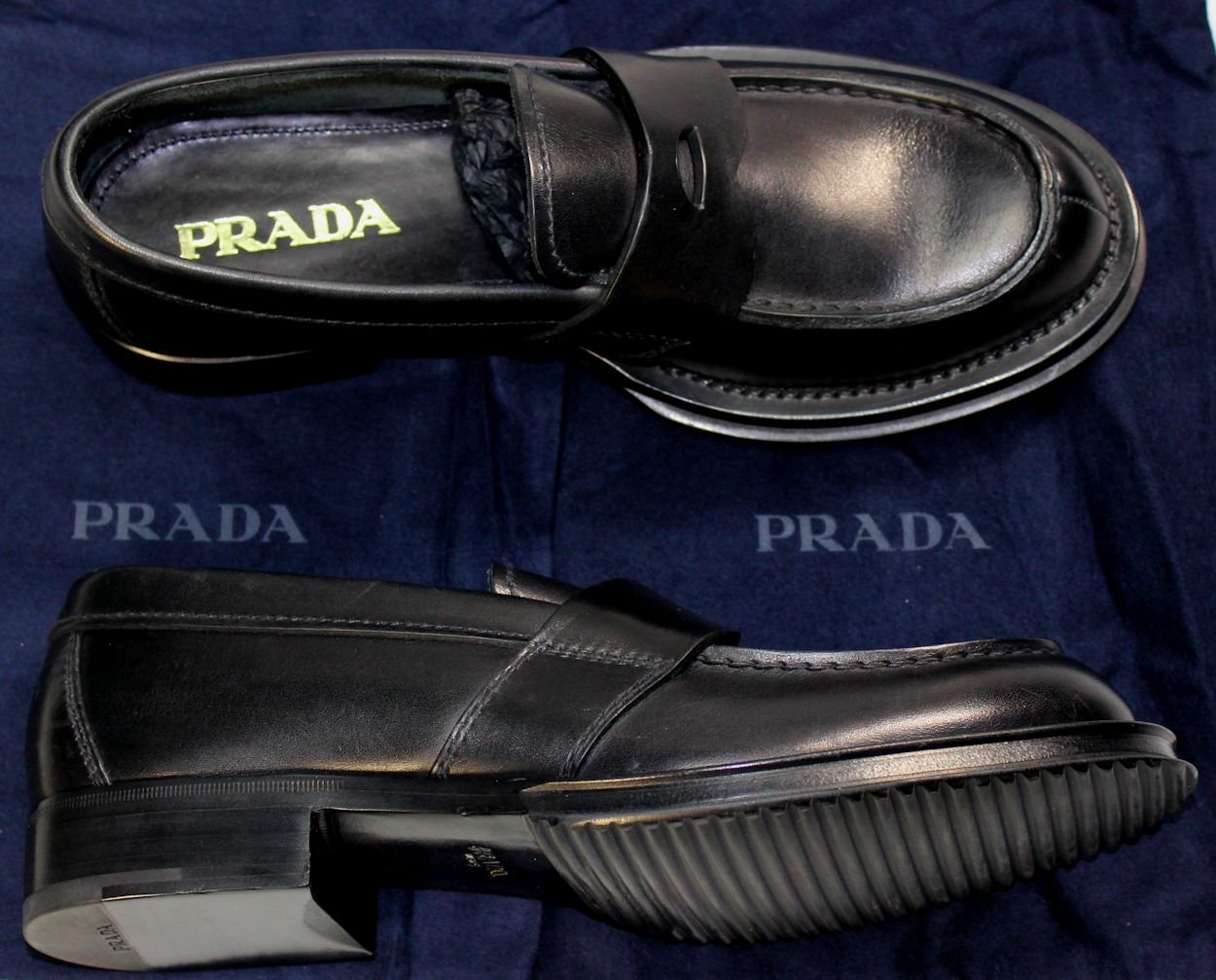 prada triple black runners