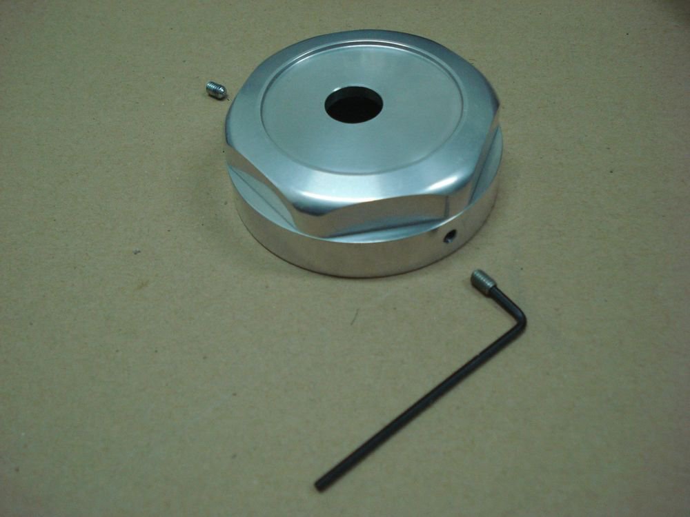 Honda Ruckus gas cap cover with a screw driver