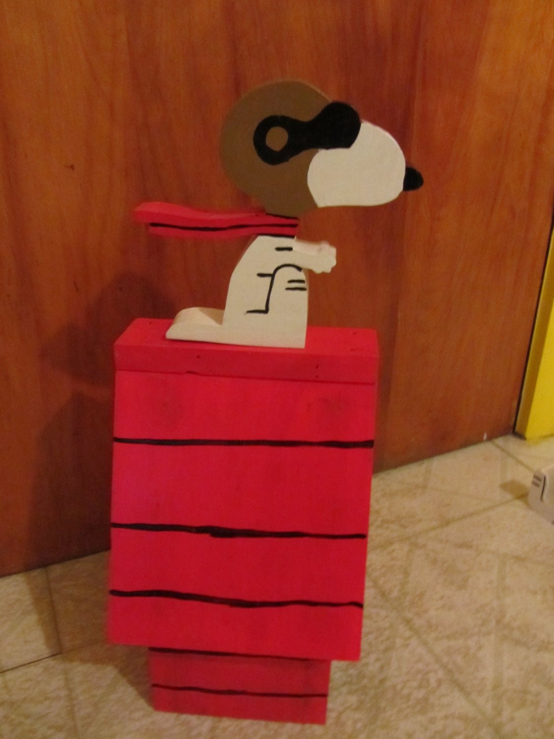 wooden snoopy figure