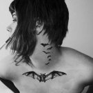 2 tattoos in a sticker Creative jean style black bat tattoo design for neck