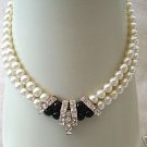Beautiful 2 row blacks &white pearl necklace