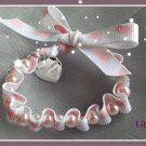 Personalised Girls Pink Footprint Ribbon and Bead Bracelet Any Charm Christening