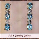 3.28 carat Blue Topaz & Diamond earrings