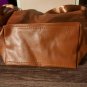 Brown Leatherlike Tote Bag With Ribbon Look Strap