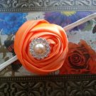 Handmade orange rosette pearl rhinestone newborn bow with matching headband
