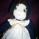 doll with brown hair and green eyes