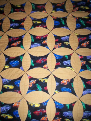 throw quilt multi color modern cars on black with tan flannel 62 x 46
