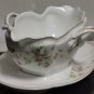 Antique European Hand Painted Floral Porcelain Gravy Boat with Underplate 19th c