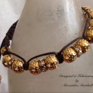 Chocolate wrapped gold peanut with Crystal Macrame Bracelet $49
